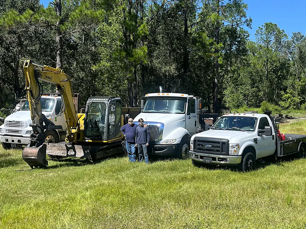 Guy and Andrew McMillen with Breaking Ground equipment