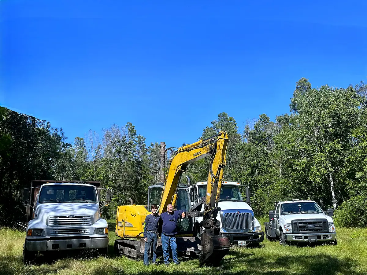 Breaking Ground hero equipment and trucks